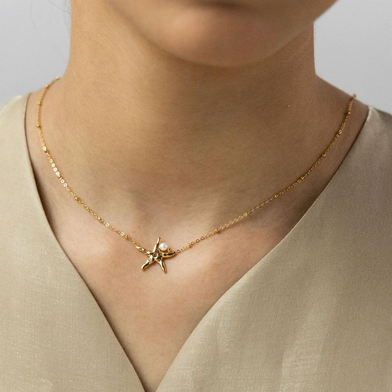 قلادة نجمة البحر الوردية بالكريستال مع لؤلؤة