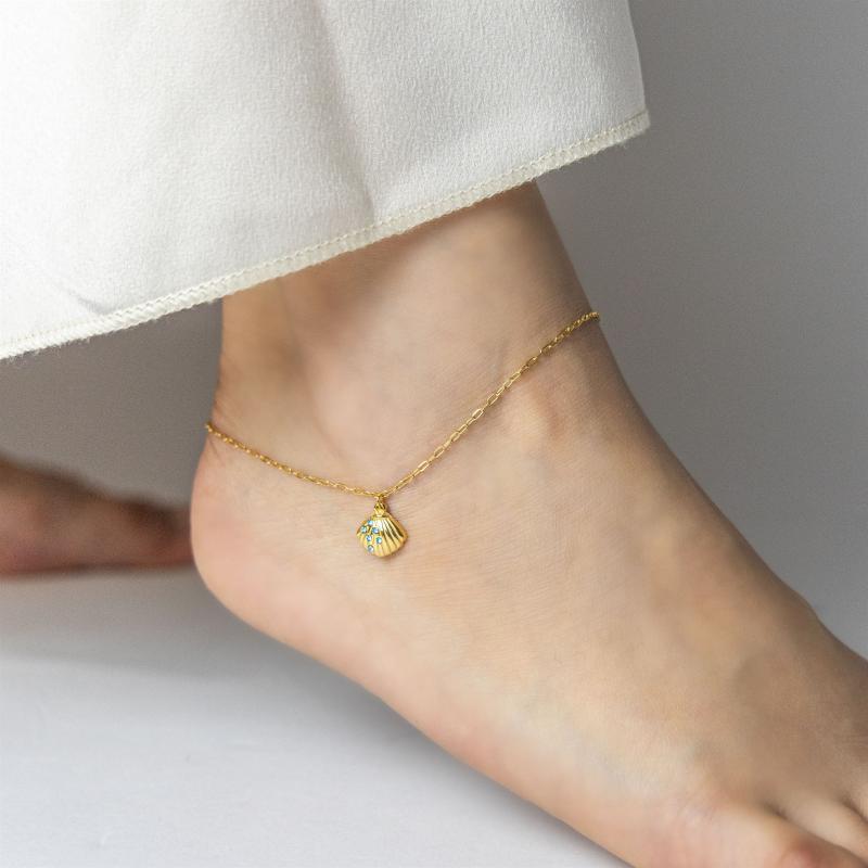 خلخال بقوقعة بحرية و6 أحجار زرقاء صغيرة