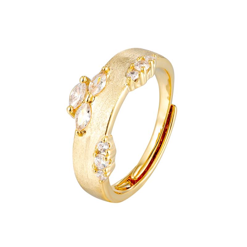 خاتم ذهبي بشريط مع أحجار ماركيز وأحجار صغيرة للزينة