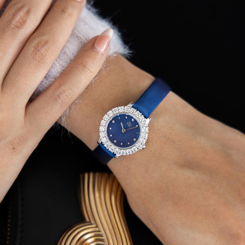 ساعة باريس بوتيك دائرية بالألماس مع جلد أزرق معدني