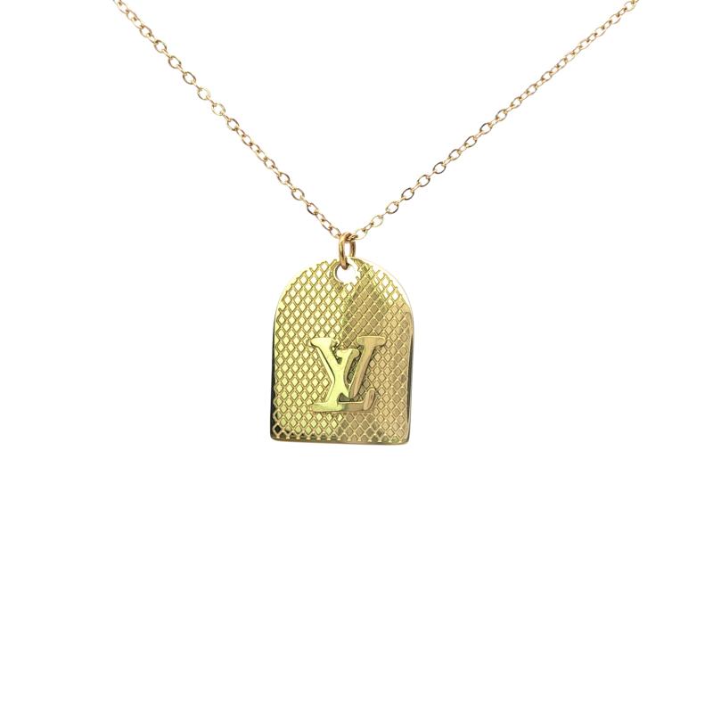 عقد لوحة شعار إل آند في